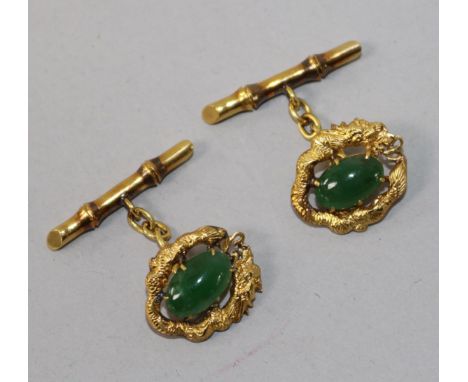 A pair of Chinese yellow metal and jadeite cufflinks.