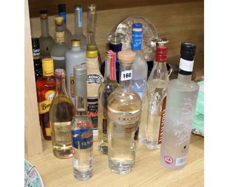 Box Mixed Spirits to include Uluvka, Vodka, Grey Goose Vodka, Excellia Tequila and Clement Rum, some opened.