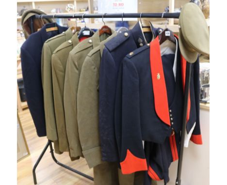 A collection of Royal Army Ordnance Corps Major's service and mess dress uniforms, comprising service greatcoat, three jacket