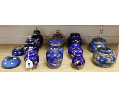 Ten Carlton Ware blue chinoiserie-decorated jars, including tobacco, two similar ashtrays and another Carlton jar and cover (