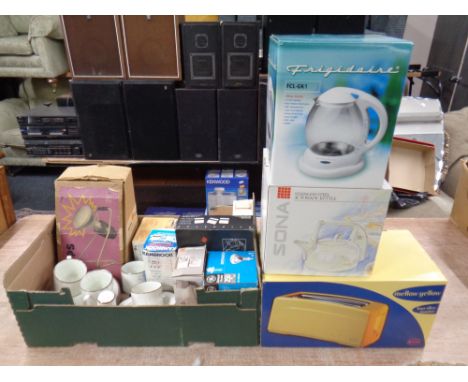 A quantity of assorted electricals to include toasters, kettles, hair dryer, air purifier etc (boxed), together with a potter