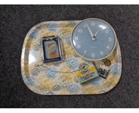 A Players's Navy Cut tin tray together with a Will's Woodbines glass ashtray and a mid 20th century Westclox wall clock. 