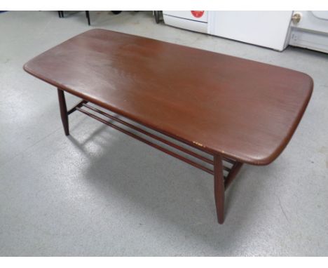 An Ercol elm and beech coffee table with under shelf in antique finish 