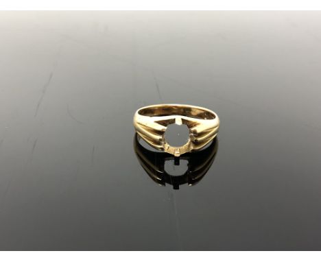 An 18ct gold vacant ring, size Q.  CONDITION REPORT: 5.9g. 