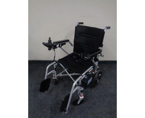 A Mobility plus electric light weight wheel chair (less than six months old)