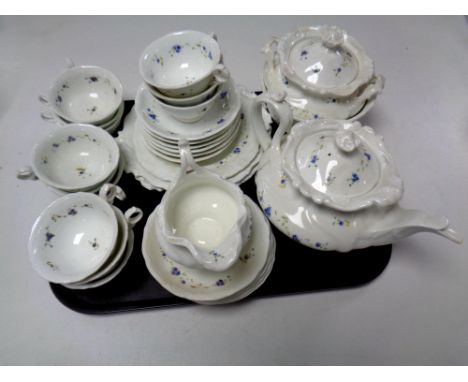 A tray of thirty one piece nineteenth century glazed pottery tea service 