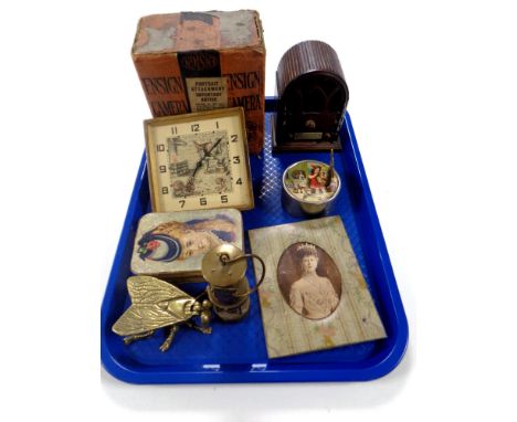 A tray of miniature brass miner's lamp, mid century mantle clock, boxed Ennis camera, Rowntrees frame etc 
