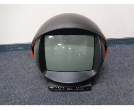 A 1980's Philips Discoverer space helmet TV together with a further Philips table lamp 