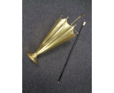 A brass stick stand in the form of a parasol together with a 19th century ebonised walking cane. 