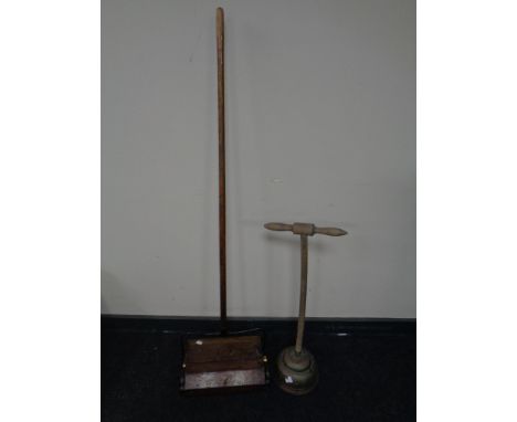 A vintage Federation carpet sweeper together with a poss stick. 