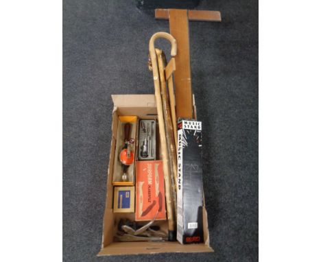 A box of draughtsman's squares, music stand, walking sticks, vintage hand tools. 