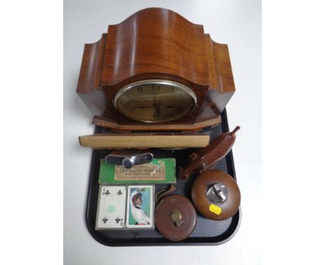 A tray of walnut cased Art Deco mantel clock (a/f), hip flask, table lighter, leather cased tape measure, dominoes etc 