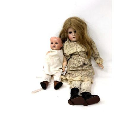 An Armand Marseille bisque headed doll (eyes loose in head), together with a German Heubach Koppelsdorf doll stamped 342-9/0.