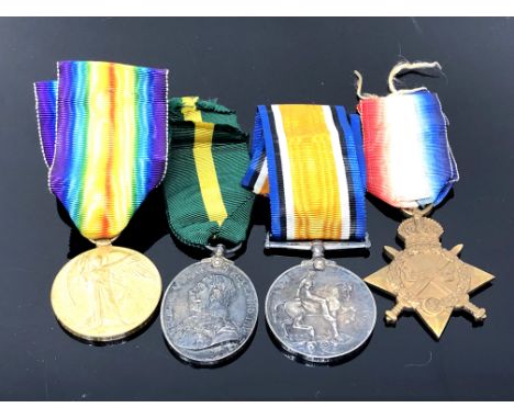 A First World War Medal group, comprising Victory Medal, British War Medal, 1914-15 Star and Territorial Force Efficiency Med