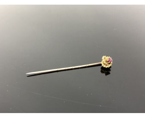 A 15ct gold ruby stick pin.  CONDITION REPORT: 1.5g