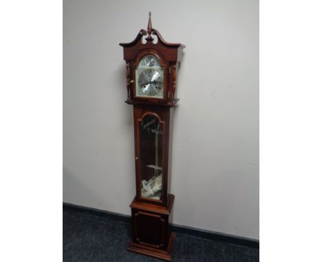 A Tempus Fugit granddaughter clock. 
