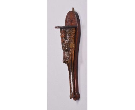Taxidermy: A Gharial Crocodile Console (Gavialis gangeticus), circa late 19th/early 20th century, a mounted juvenile head as 