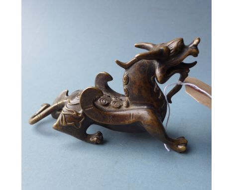 A Chinese bronze figure of a dragon 