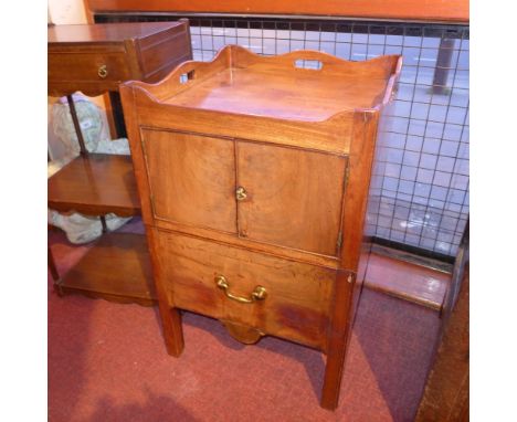 A George III mahogany tray top commode having pair of panel doors and deep drawer 
