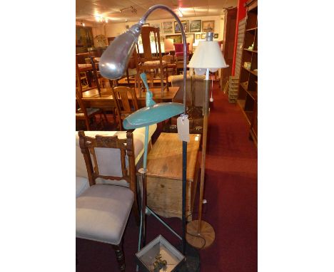 A retro chromed adjustable reading lamp, a vintage painted lamp and one other