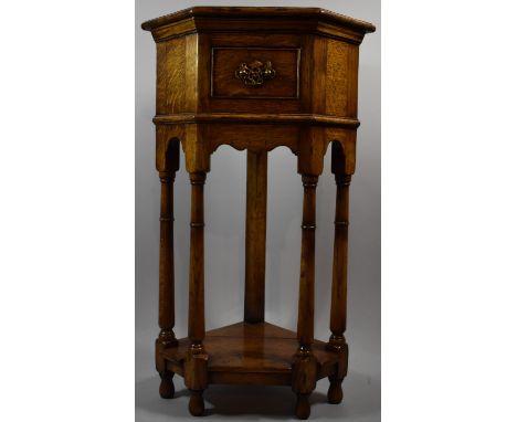 A Good Quality Light Oak Corner Stand with Single Small Drawer and Stretcher Display Shelf, Turned Supports, 69cm High and 39