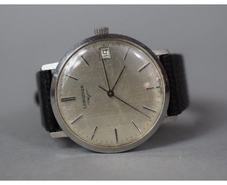 A 1970's Longines Wrist Watch with Silvered Dial, Battens and Subsidy Calendar dial. No.522371, Complete with Receipt from Ja