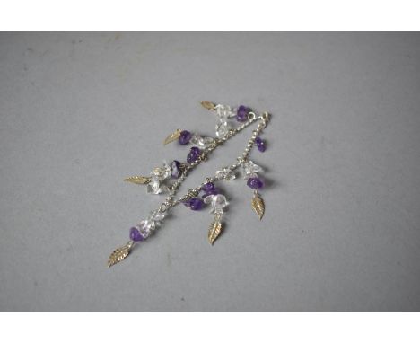 A Silver Bracelet with Amethyst and Quartz Chips and Stylised Feather Decoration 