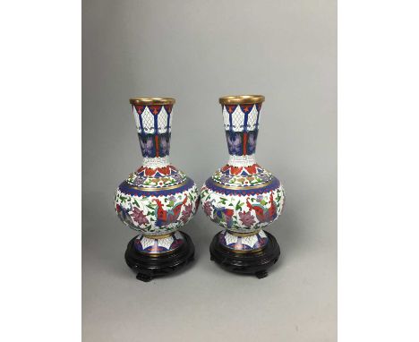 PAIR OF CHINESE 20TH CENTURY CLOISONNE ENAMEL VASES,decorated with birds and butterflies, both on hardwood stands, height ove