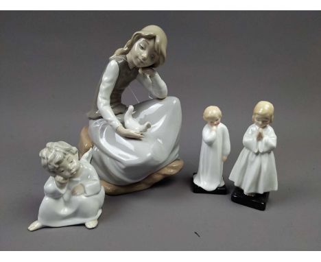 NAO FIGURE OF A GIRL WITH DOVE,25cm high, along with a Lladro winged child, Royal Doulton figures of 'Darling' and 'Bedtime' 
