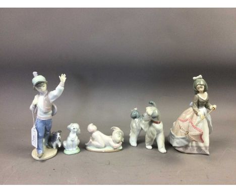 FIVE LLADRO FIGURES OF CHILDREN,along with three Lladro dogs (8)Condition report: Several with loose pieces to interior, girl