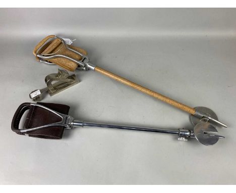 TWO SHOOTING STICKS,along with a nut cracker (3)