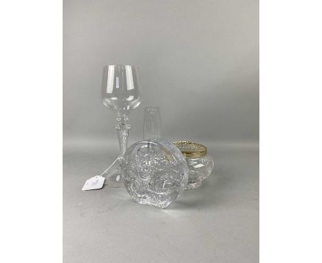 TWO EDINBURGH CRYSTAL POT POURRI,the larger measuring 12.5cm diameter, along with an amythst coloured crystal pot pourri, and
