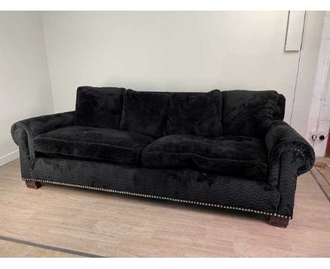 PAIR OF DESIGNER THREE SEATER SETTEES,reputedly retailed by Harrods, each 250cm wideCondition report: Springs and upholstery 
