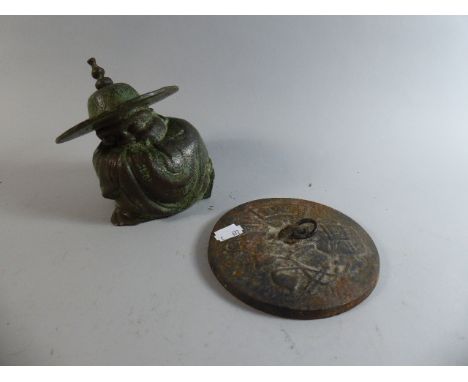 An Oriental Bronze Study of a Sleeping Immortal, Together with a Circular Metal Lid, 14cm Diameter