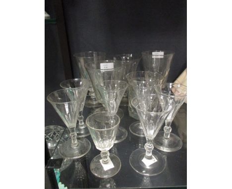 A set of four facet cut wine goblets & six custard cups  