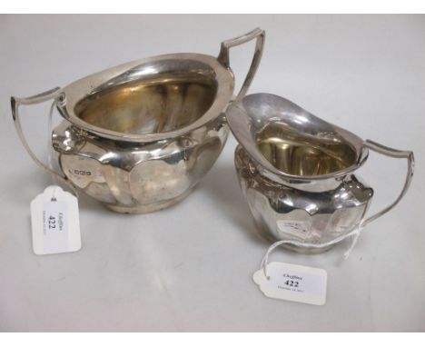 A silver sugar basin and matching cream jug by James Deakin & Sons, Sheffield 1912  