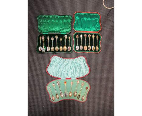 Cased collection of enamel and silver souvenir spoons (3)