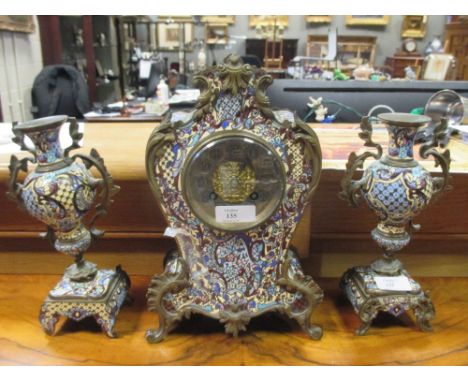 An early 20th century French champleve clock garniture  