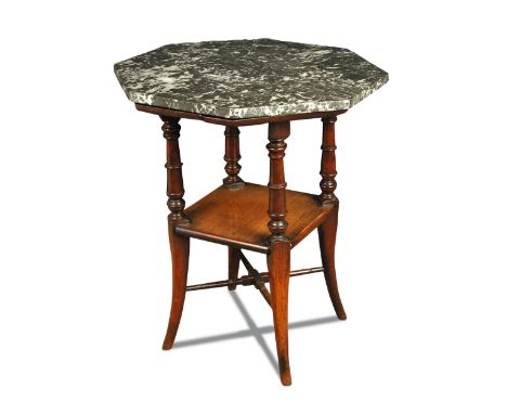 In the manner of E. W. Godwin, a marble topped centre table, the octagonal top on ring-turned supports to a second tier below