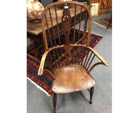 A 19th century ash and elm stick back Windsor armchair and a mahogany side chair with shaped splat (2)  