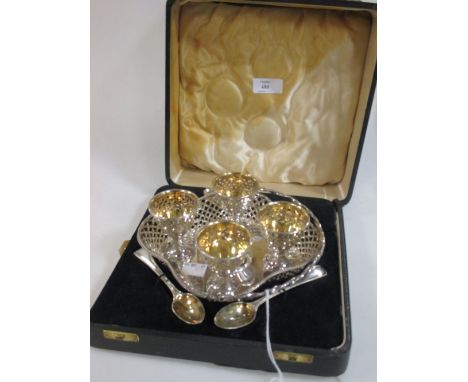 A Victorian silver egg cup stand, the stand with lattice decoration, Sheffield 1861, Henry Wilkinson & Co, with three Old Eng