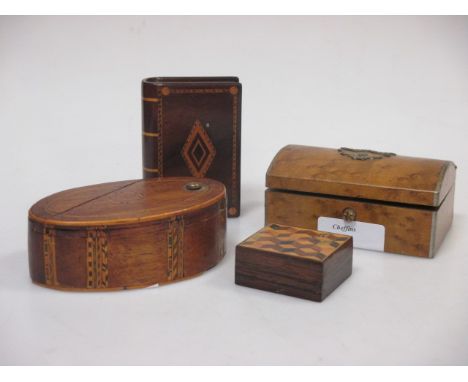 A 19th century marquetry oval trick box, a Tunbridge ware snuff, a book form box and a bird's eye maple stamp casket (4)  
