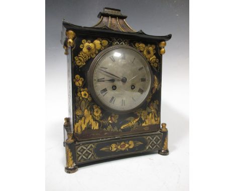A 1920's Chinoiserie decorated 8 day mantel clock with pagoda top, 31 cm high  