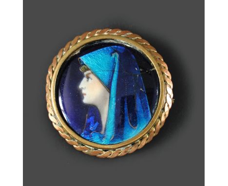 A Limoges enamel brooch, depicting a pre-raphaelite female portrait, signed to reverse 'Betourne,Limoges' 4cm (2in)  