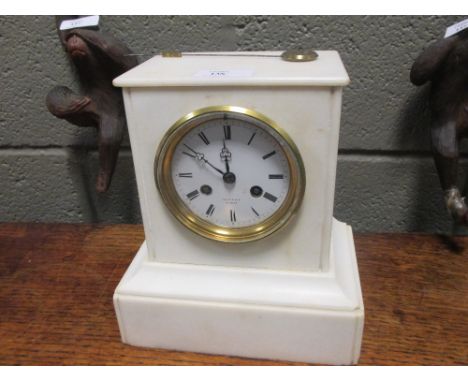 A Victorian white marble cased clock  