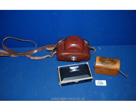 A quantity of miscellanea including a Kodak Colorsnap 35 camera, leather camera case, souvenir Mauchlinware box and boxed pai