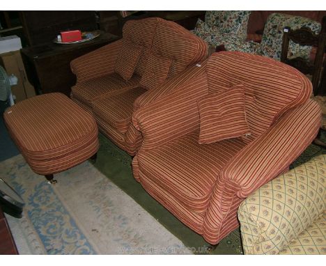 A modern three piece Lounge Suite comprising two seater sofa, matching armchair and large footstool, the sofa and chair havin