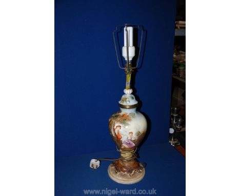 A large hand-painted Lamp on marble base depicting a courting couple