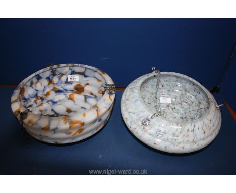 Two Art Deco marbled glass light shades, one in white, blue and orange colours, the other mainly white with blue and orange f
