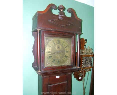 A Georgian Mahogany longcase Clock having swan pediment hood with turned column supports flanking the single pane glass door 